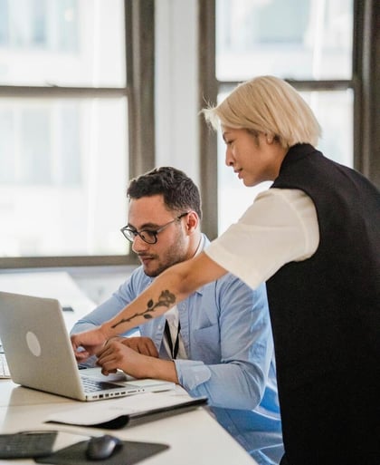 Professionals managing a complex OpenText Archive Server to SharePoint migration